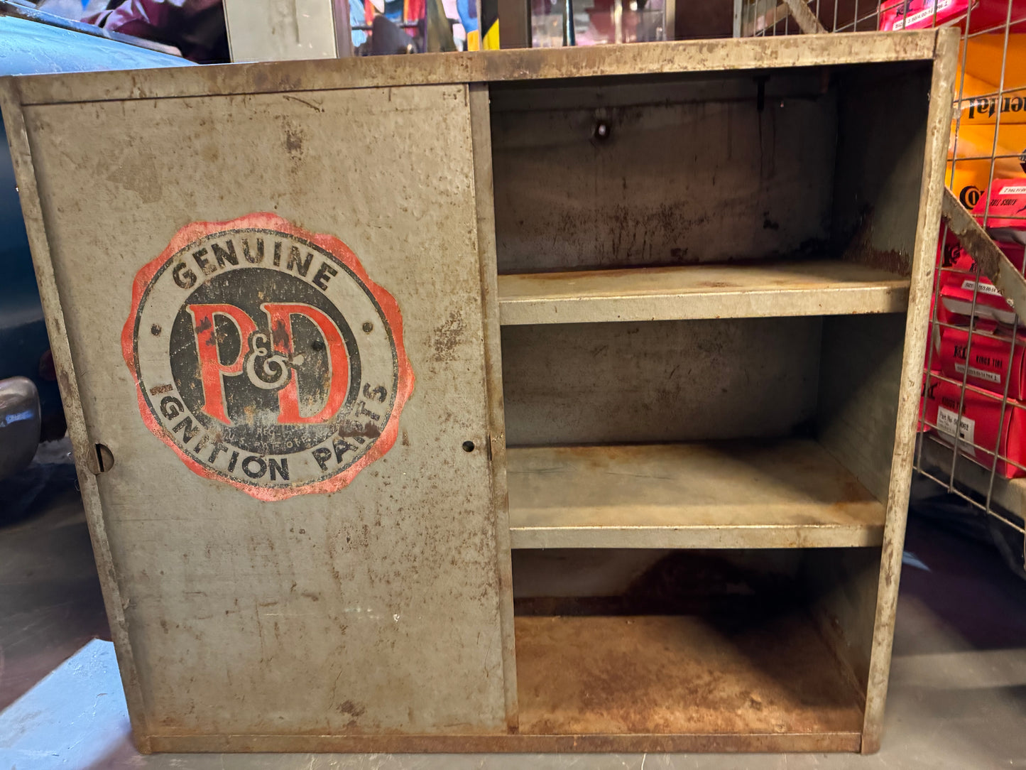 VINTAGE P AND D IGNITION PARTS METAL CUPBOARD WITH SLIDDING DOORS