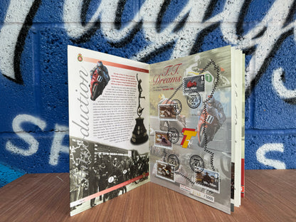 VINTAGE LIMITED TT DREAMS HONDA 50TH ANNIVERSARY BOOK WITH COIN AND STAMPS.