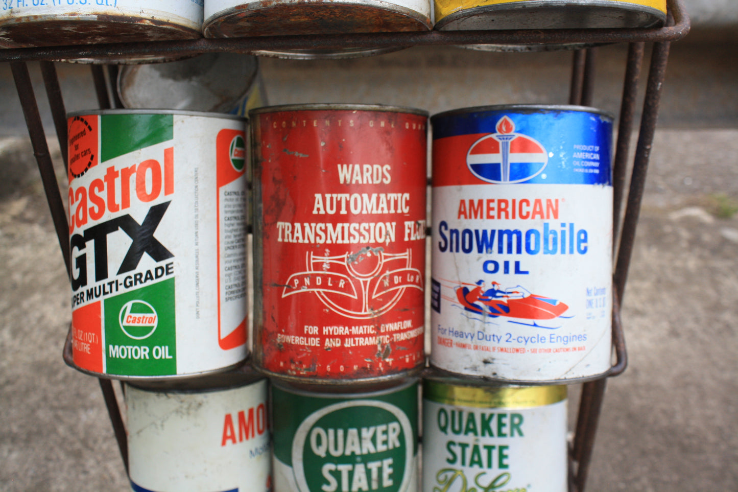 VINTAGE MOTOR OIL CANS AND DISPLAY RACK